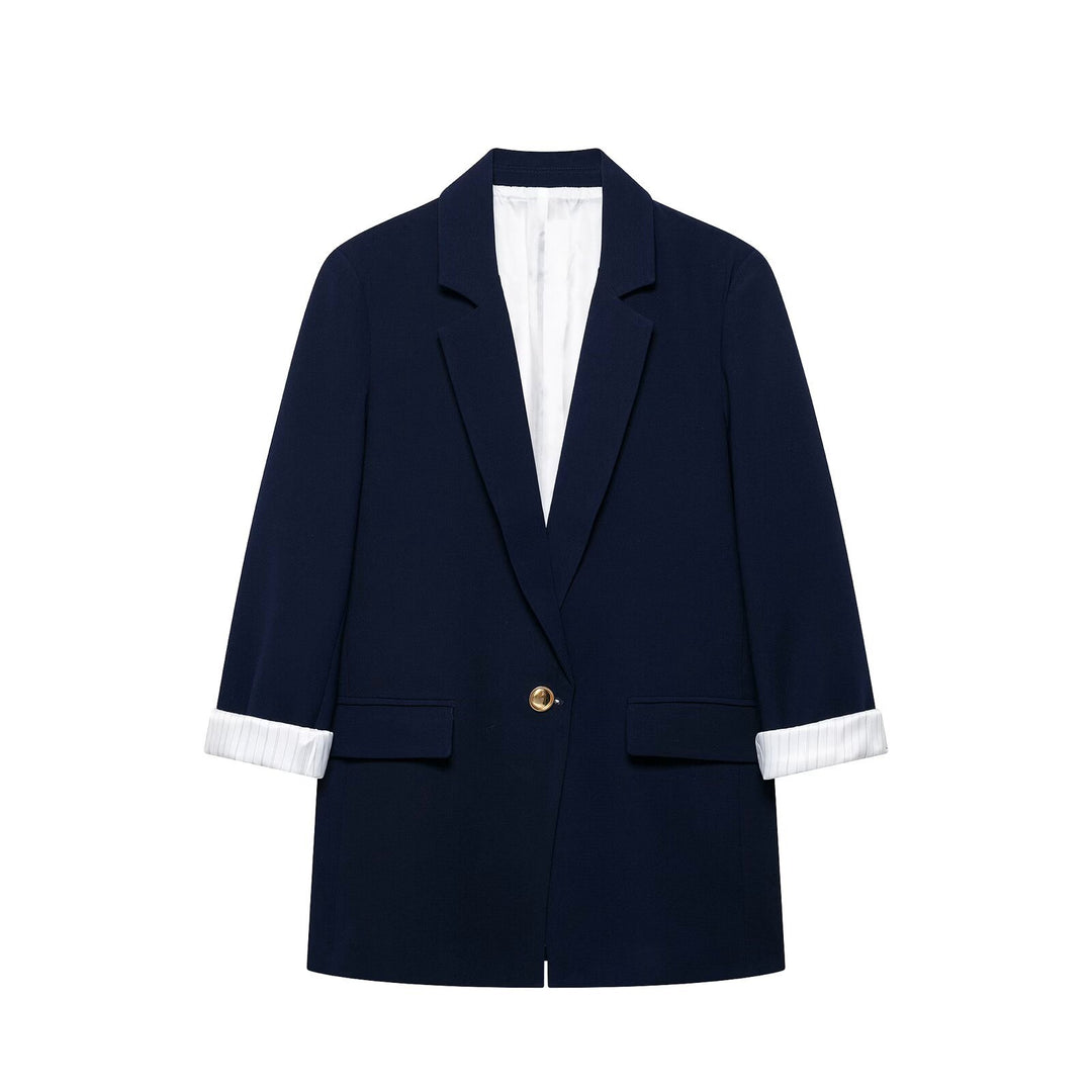 Women's tailored long blazer with cuffed sleeves and decorative button Mune Fashion