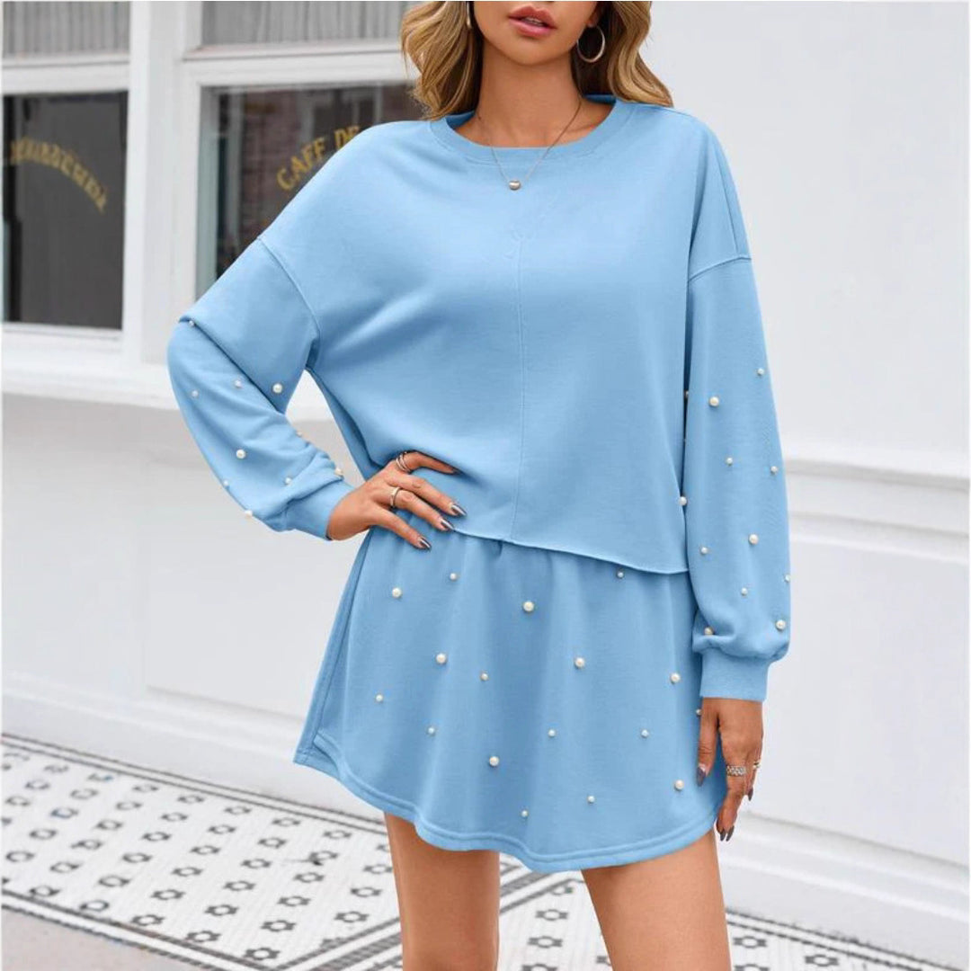 Ladies nan pearl-embellished sweat set with oversized sweater and flared mini skirt Mune Fashion