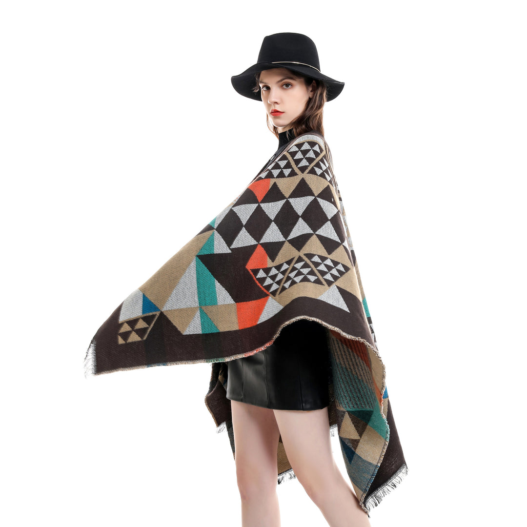 Women's oversized ruana in jacquard wrap style with triangular pattern and fringe hem Mune Fashion