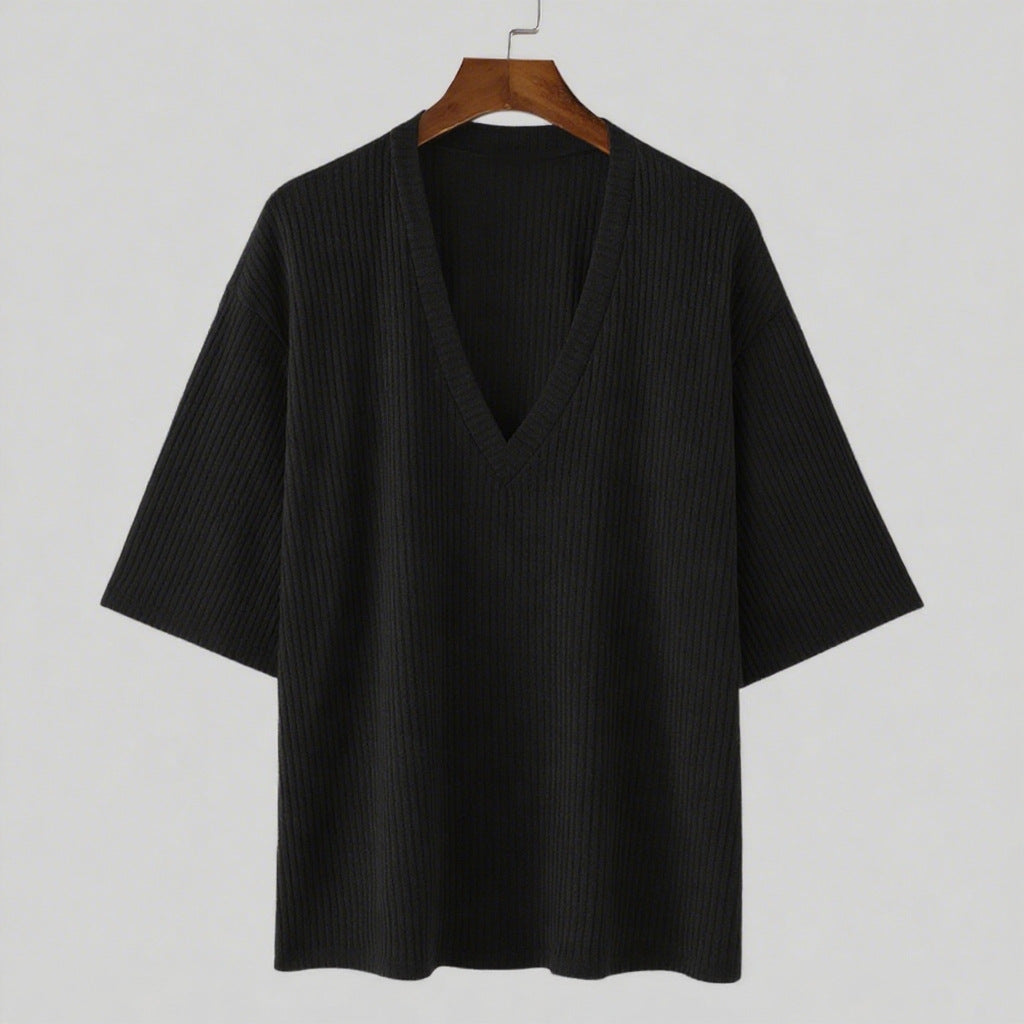 Women's oversized V-neck knit top with textured ribbed look and half-length sleeves Mune Fashion