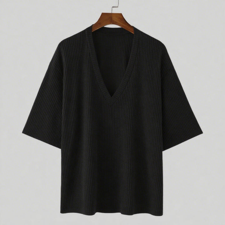 Women's oversized V-neck knit top with textured ribbed look and half-length sleeves Mune Fashion