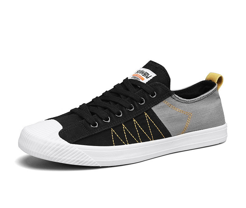 Unisex low canvas sneakers with reinforced rubber toe cap and contrasting textile panels Mune Fashion