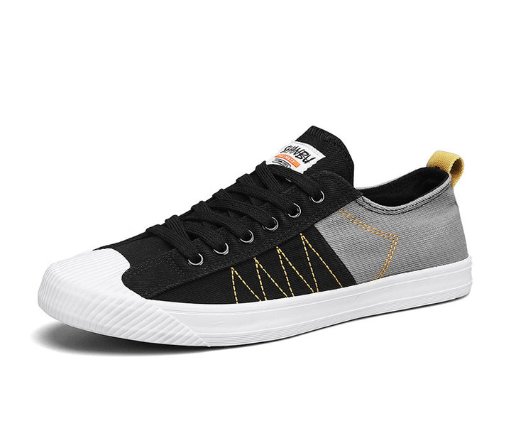 Unisex low canvas sneakers with reinforced rubber toe cap and contrasting textile panels Mune Fashion