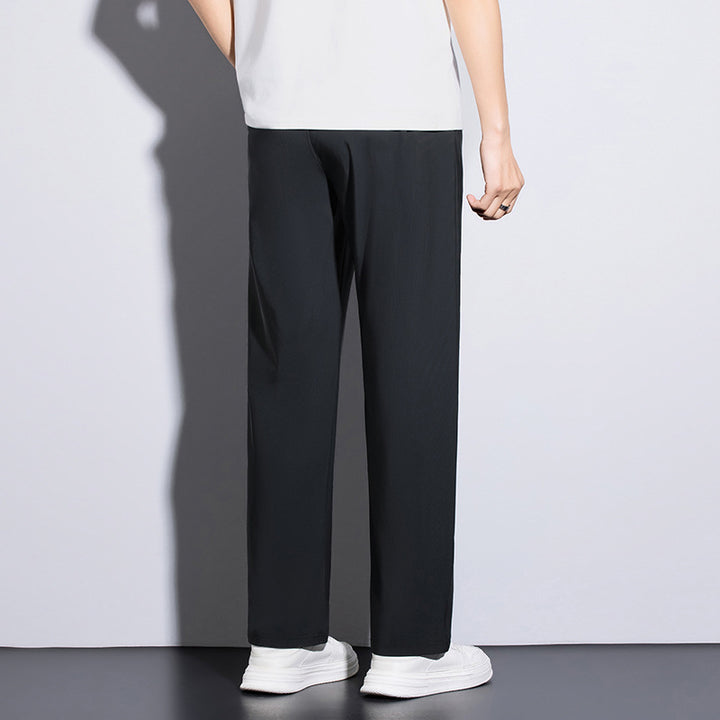 Men's sporty training pants with elastic waistband and practical pockets Mune Fashion