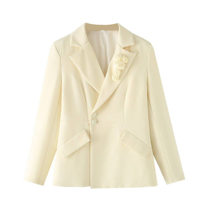 Women's tailored two-button blazer with decorative roses at the lapel and patch pockets Mune Fashion
