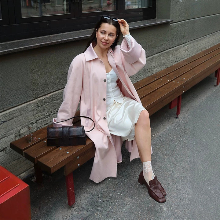 Women's midi coat made of wool blend with dropped shoulders and concealed snap button placket Mune Fashion