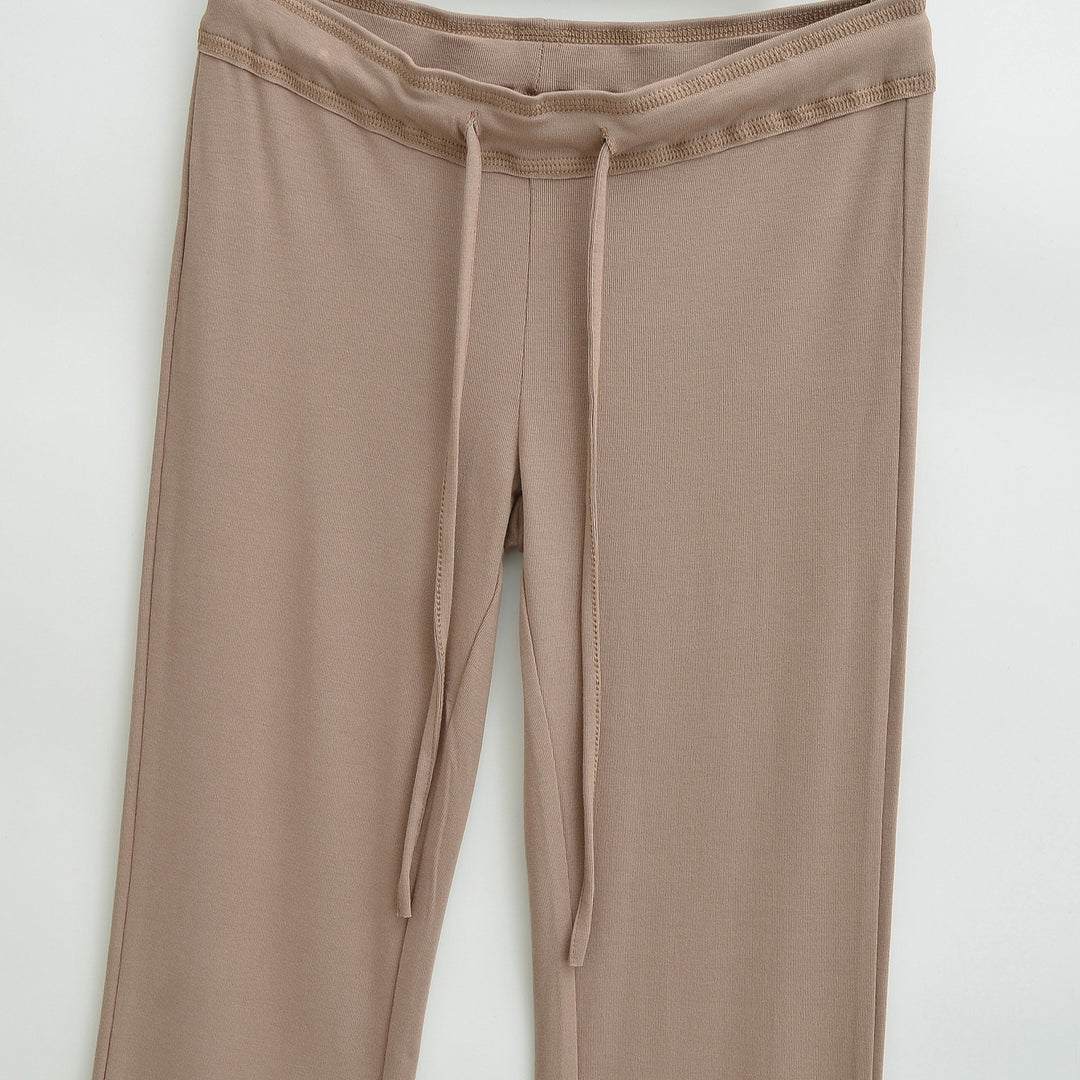 Women's Flowing Jersey Pants with High Waist, Drawstring and Flared Leg Mune Fashion