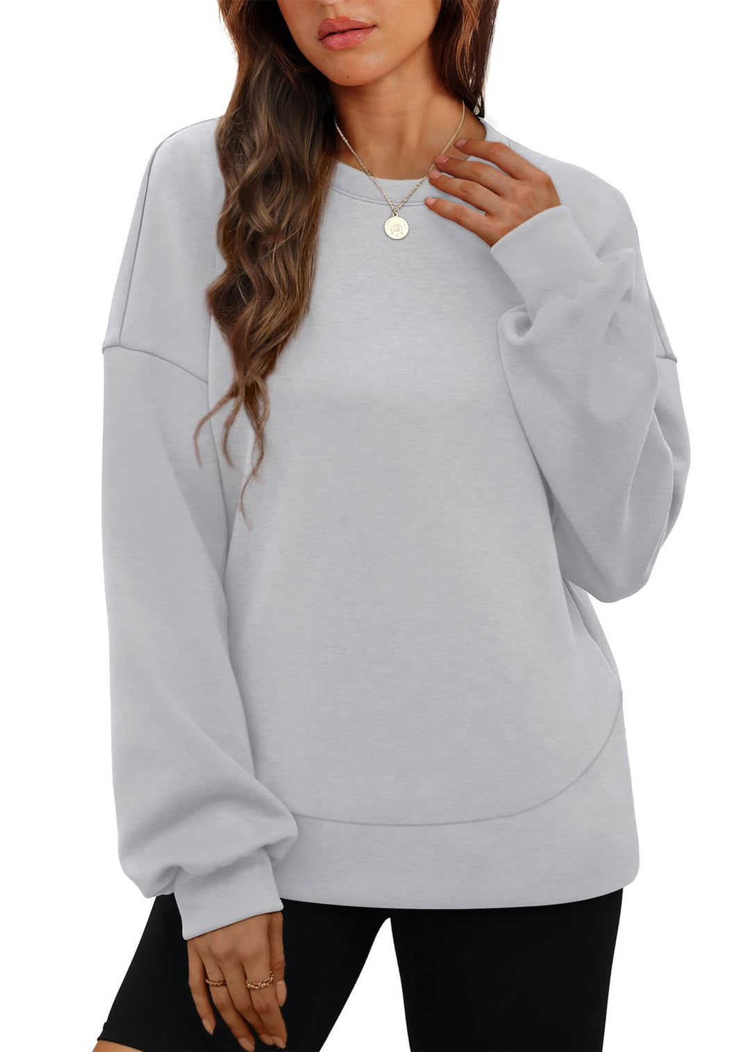 Women's casual oversized round neck sweatshirt with dropped shoulder, rounded hem, and soft inner lining Mune Fashion