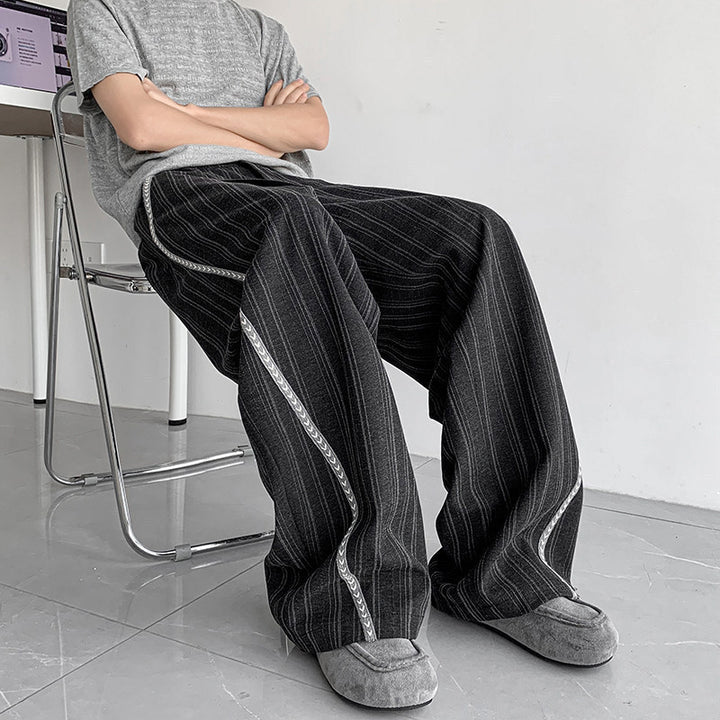 Men's loose baggy trousers in suit look with fine pinstripe and braided side piping Mune Fashion