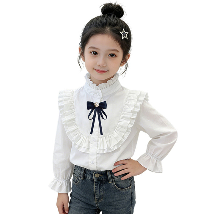 Girls elegant ruffle blouse with decorative bow closure Mune Fashion