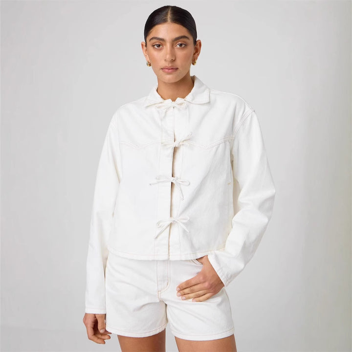 Women's short denim jacket with decorative knot closures, boxy silhouette and shirt collar Mune Fashion
