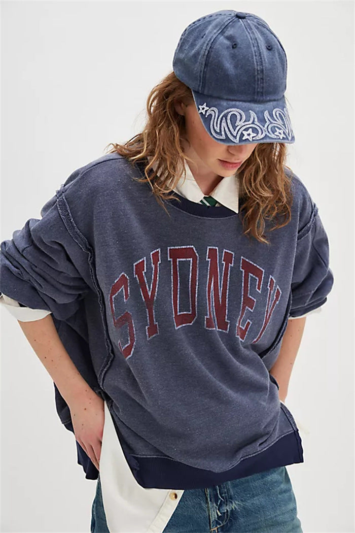 Women oversized sweatshirt with beet print, fringed seam accents and thumbhole sleeves Mune Fashion