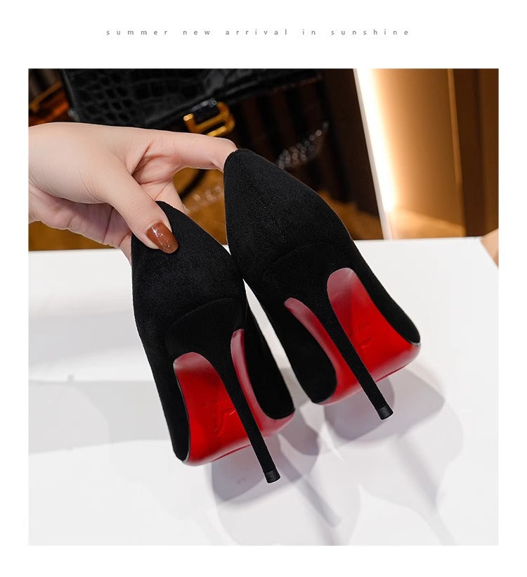 Ladies elegant pointed suede pumps with contrasting red sole and narrow stiletto heel