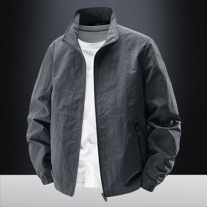 Men's minimalist functional jacket with stand-up collar, breathable mesh lining, and water-repellent zippers Mune Fashion