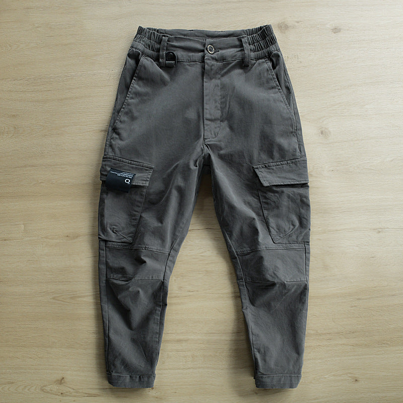 Men's cargo pants with tapered leg, elastic waistband, and reinforced knee inserts Mune Fashion
