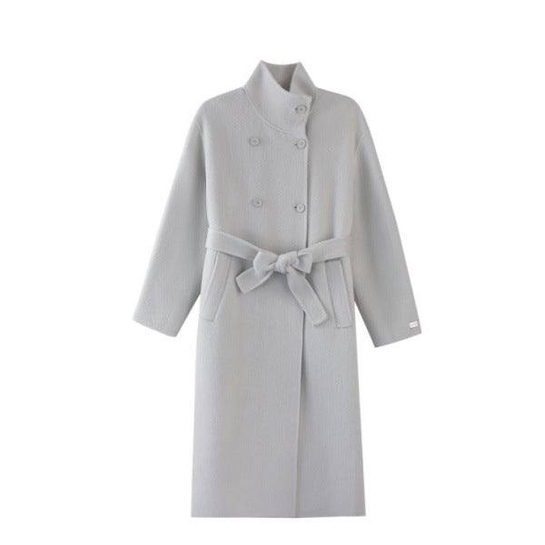 Women’s wool coat with double-breasted button placket, waist belt, and stand-up collar Mune Fashion