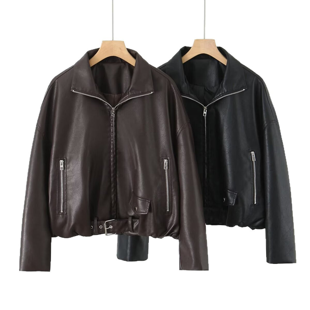 Women’s cropped oversized leather jacket in bomber style with zippered pockets and waist belt Mune Fashion