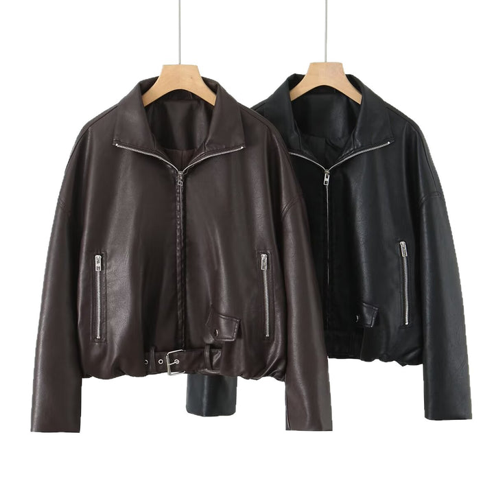 Women’s cropped oversized leather jacket in bomber style with zippered pockets and waist belt Mune Fashion