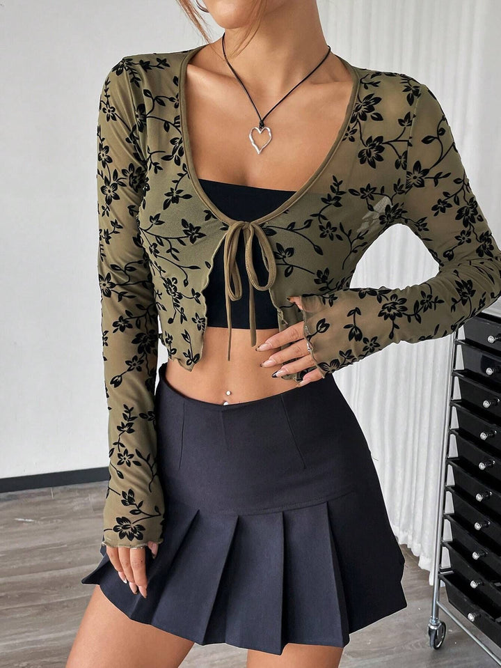 Ladies cropped fitted mesh top with floral velvet flock decoration and tie Mune Fashion