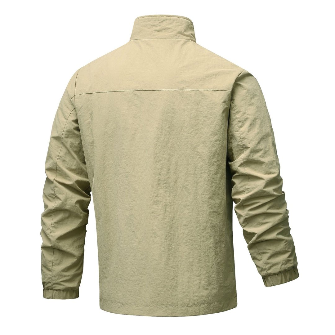 Men's lightweight technical windbreaker with mesh lining, high stand-up collar and zippered pockets Mune Fashion