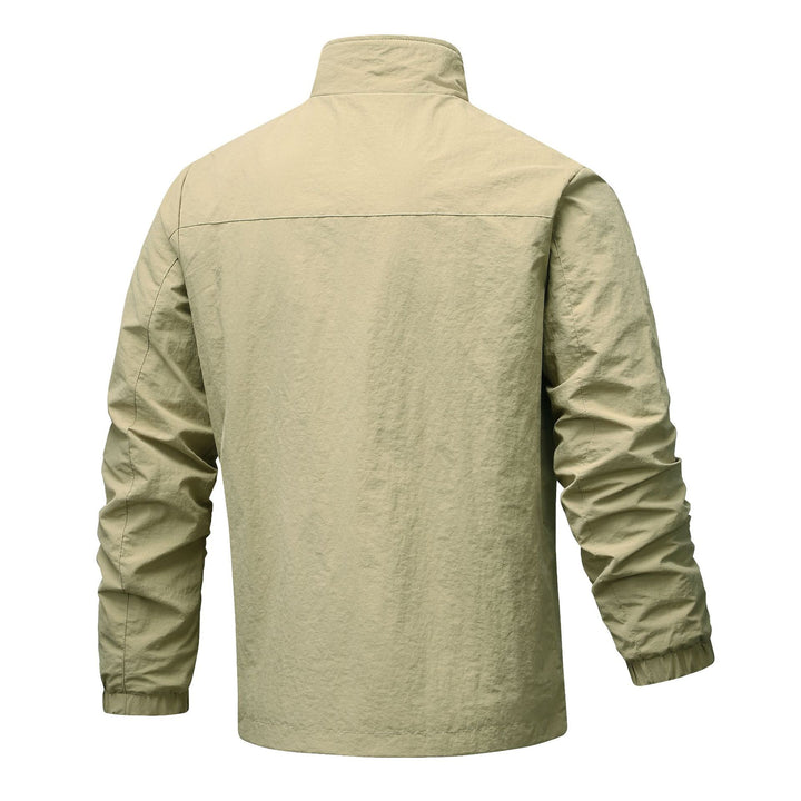Men's lightweight technical windbreaker with mesh lining, high stand-up collar and zippered pockets Mune Fashion