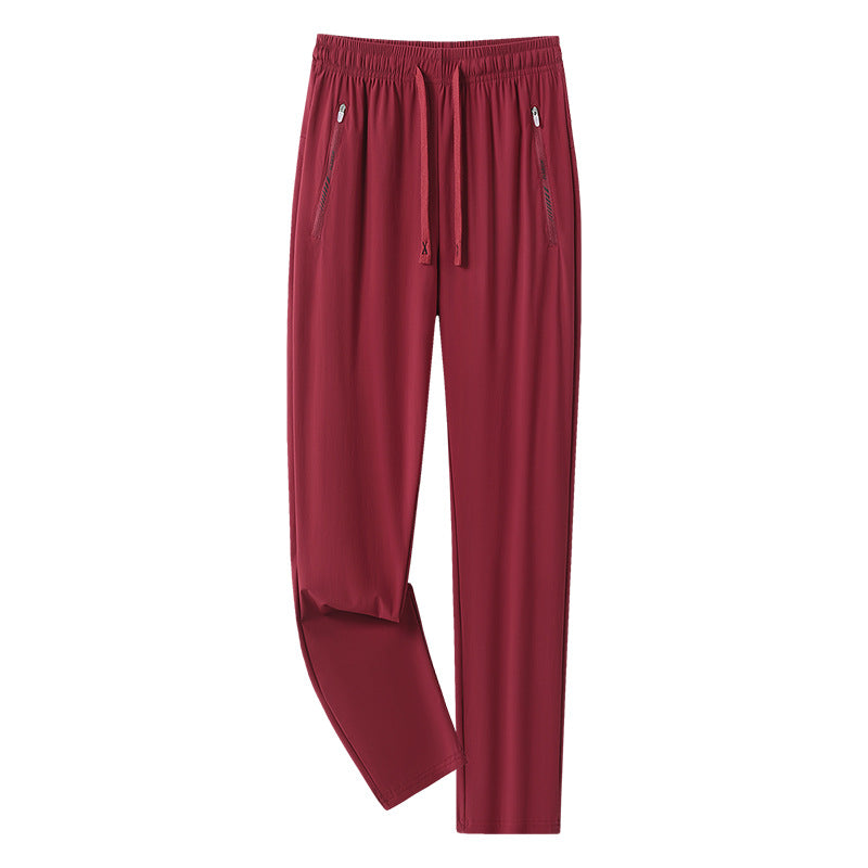 Men's sporty jogging pants with adjustable waistband and zippered pockets Mune Fashion