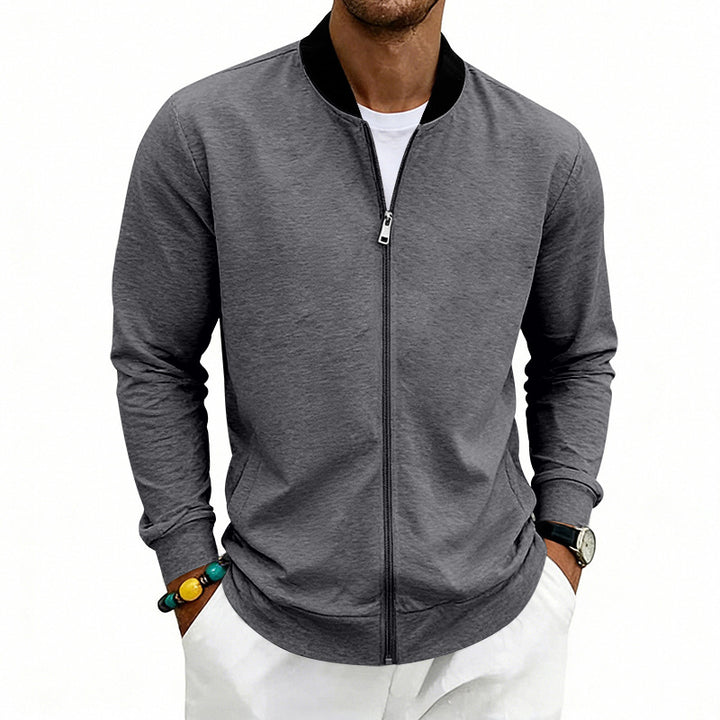 Men's lightweight bomber jacket made of jersey with stand-up collar, elastic cuffs, and concealed pockets Mune Fashion