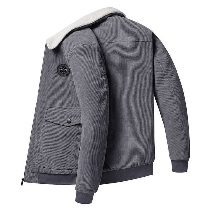 Men's cord jacket with teddy collar, patch flap pockets, and elastic cuffs.