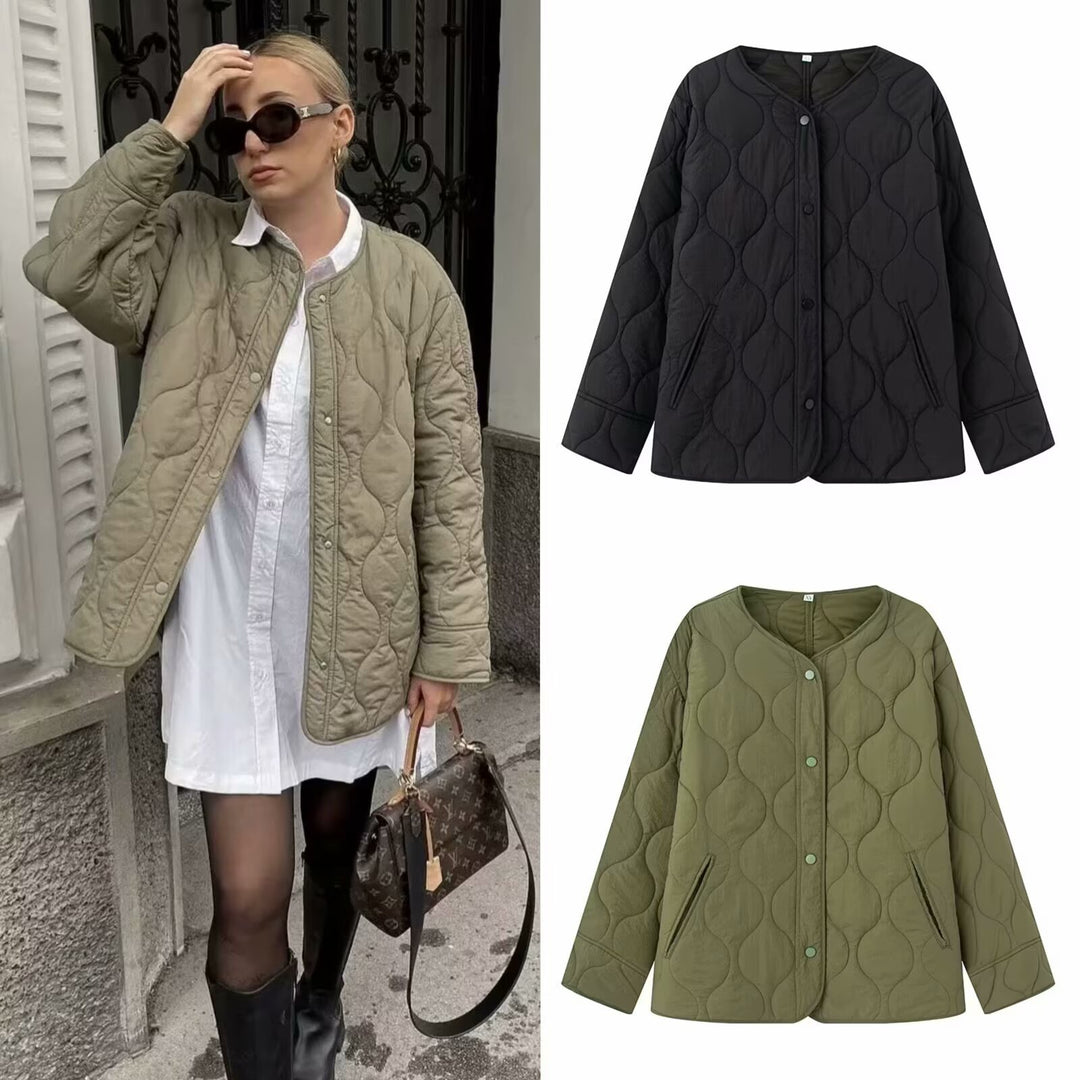 Women’s quilted transitional jacket with round neckline, light thermal padding, and concealed snap buttons Mune Fashion