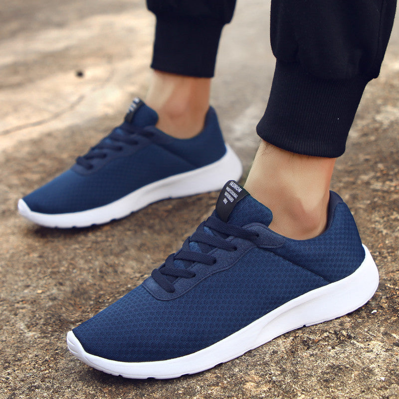 Unisex lightweight training sneakers with seamless knitted upper material, padded heel collar, and responsive EVA midsole Mune Fashion