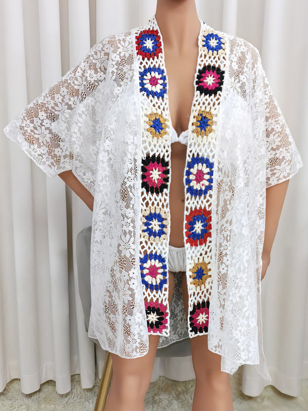 Women crocheted beach cover-up with colorful appliqués Mune Fashion