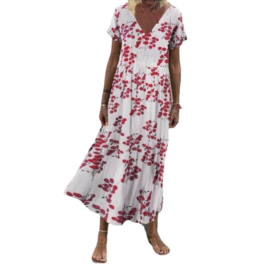 Women’s V-neck maxi dress with fine pleated skirt, empire bodice and short sleeves Mune Fashion
