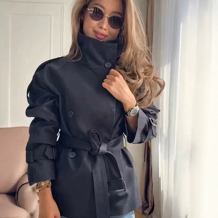 Women's Short Boxy Trench Coat with High Standing Collar, Double-Breasted Front & Waist Belt Mune Fashion