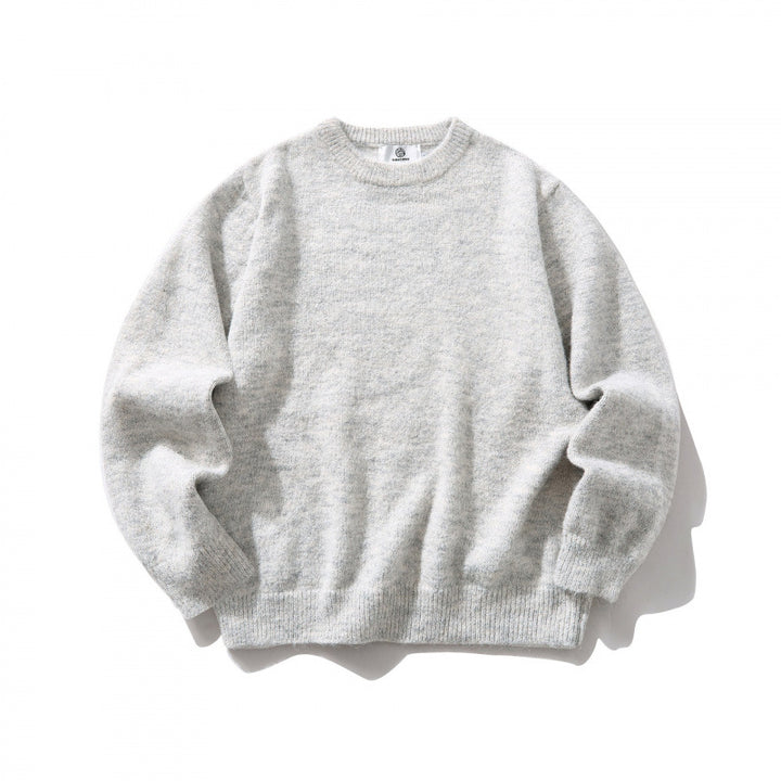 Unisex Oversize fine knit sweater with round neckline, ribbed cuffs, and mottled wool blend Mune Fashion