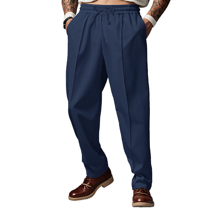 Men's sporty joggers with elastic waistband and front center seam Mune Fashion