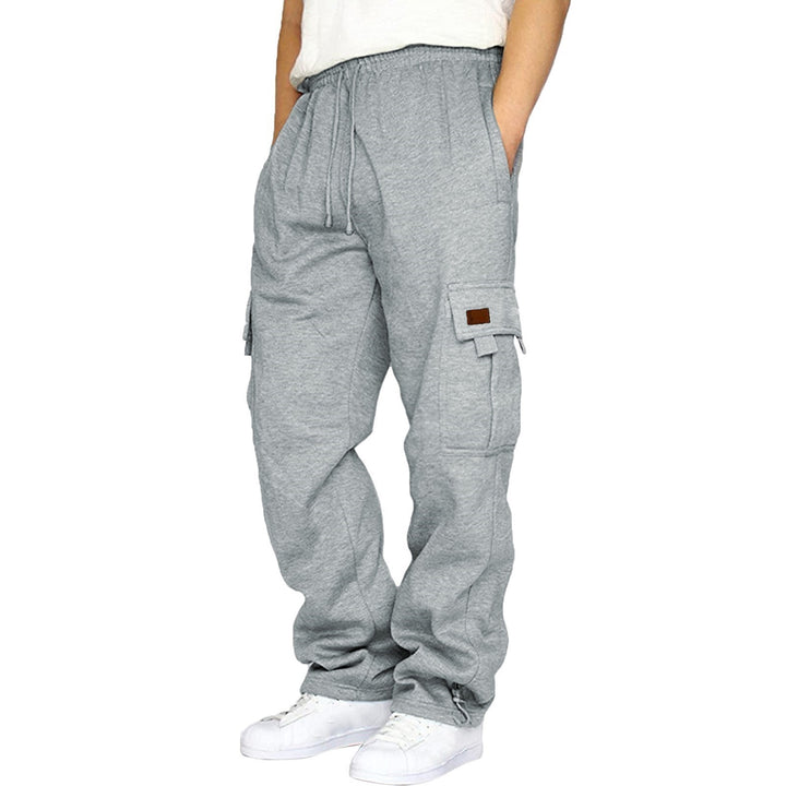 Men's tapered sweat cargo pants with elastic waistband, drawstring, and flap pockets Mune Fashion