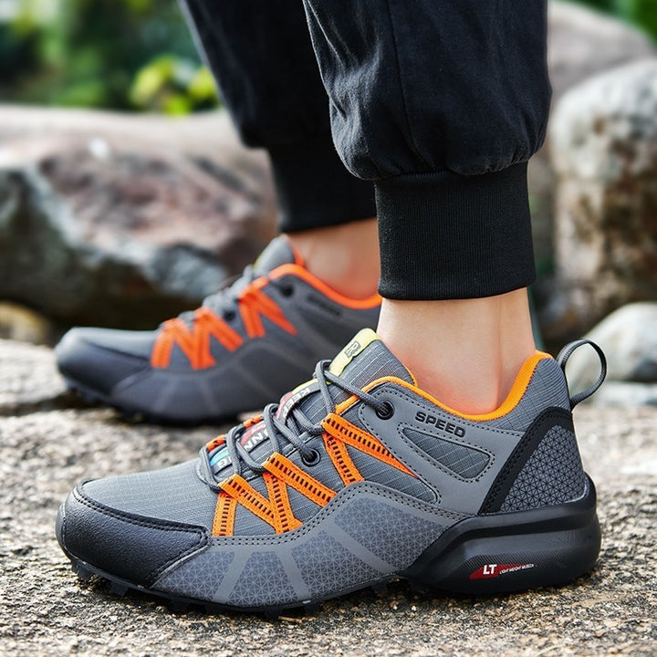 Men's robust trail running and outdoor sneaker with grippy multi-terrain profile sole, reinforced toe cap, and bungee lacing Mune Fashion