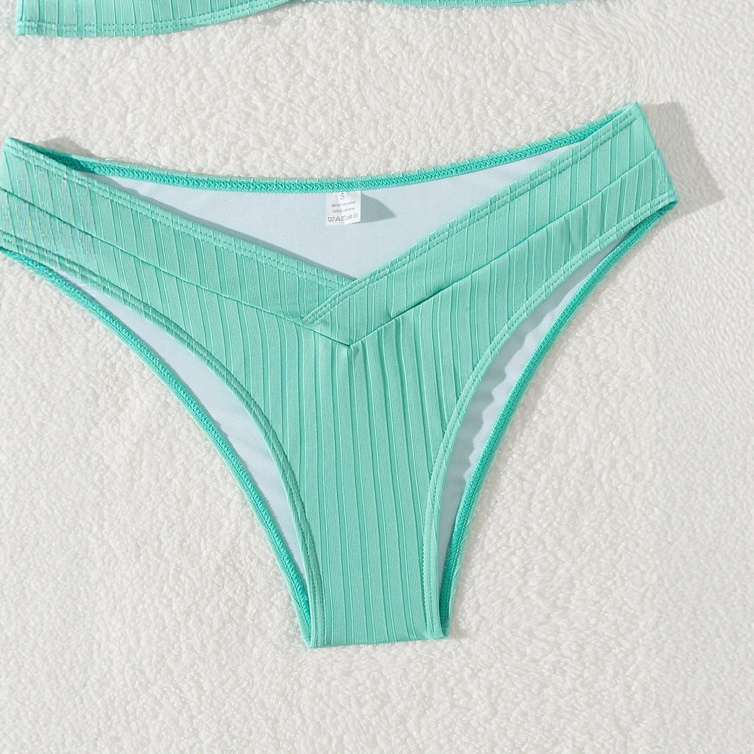 Women Sophisticated Bikini Top with V-Neck and Decorative Ring Mune Fashion