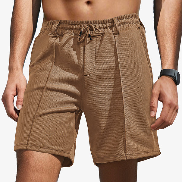 Men's knee-length sports shorts with mesh structure, elastic drawstring, and belt loops Mune Fashion