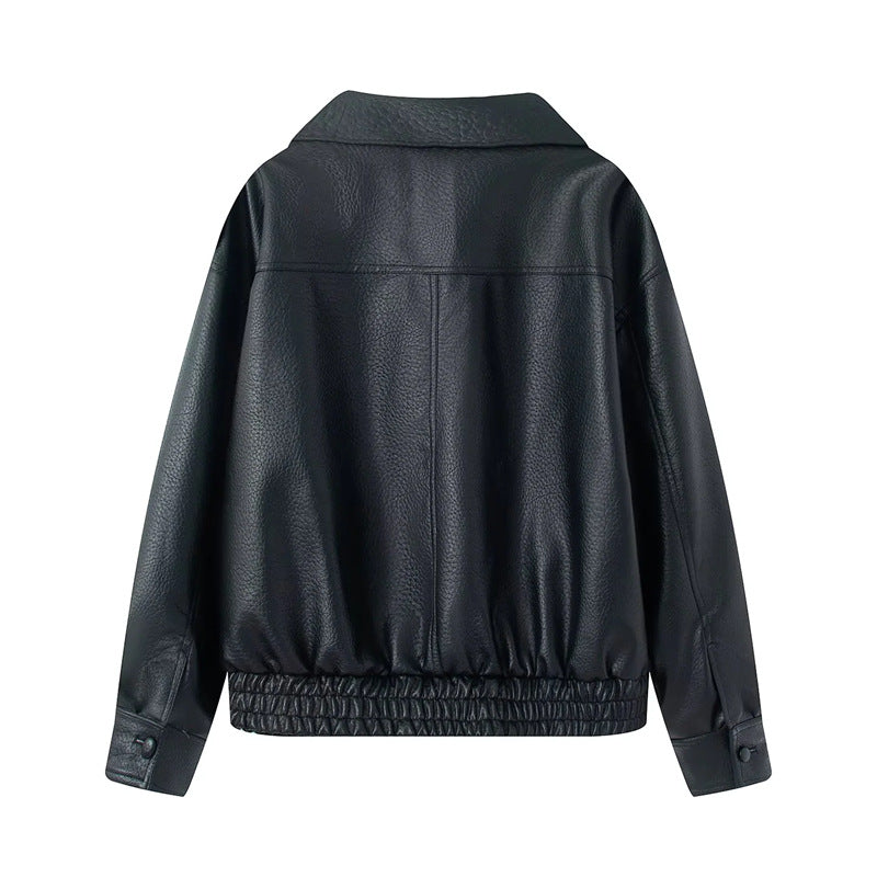 Women's short oversized faux leather blouson with shawl collar, snap button double row and elastic hem Mune Fashion
