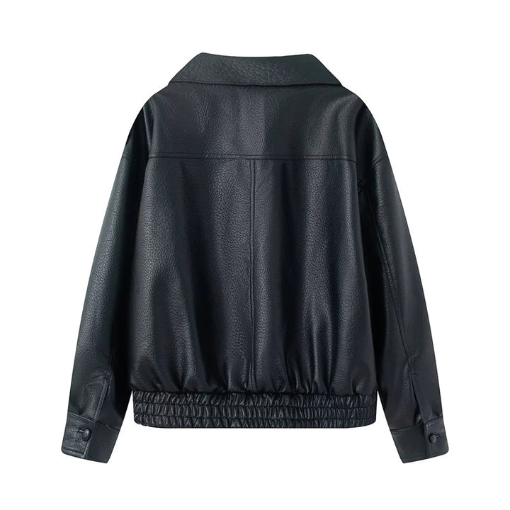 Women's short oversized faux leather blouson with shawl collar, snap button double row and elastic hem Mune Fashion
