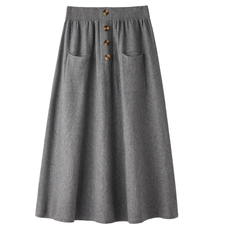 Women's midi skirt made of wool blend with A-line, elastic ribbed waistband, decorative button placket, and patch pockets Mune Fashion