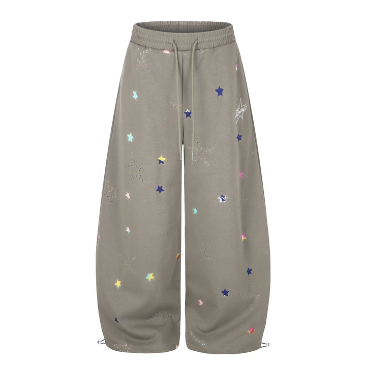 Women's extra wide palazzo capri sweatpants with star print, comfort waistband, and adjustable hem.