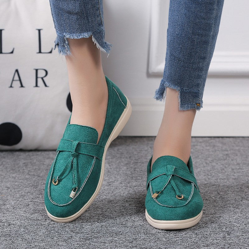 Women's casual suede look slippers with decorative cord, soft comfort insole, and flexible lightweight sole Mune Fashion