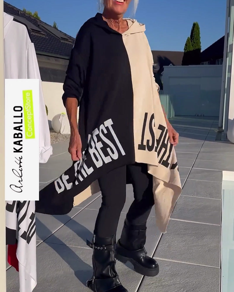 Women’s long-cut hooded poncho with asymmetric pointed hem and large statement print Mune Fashion