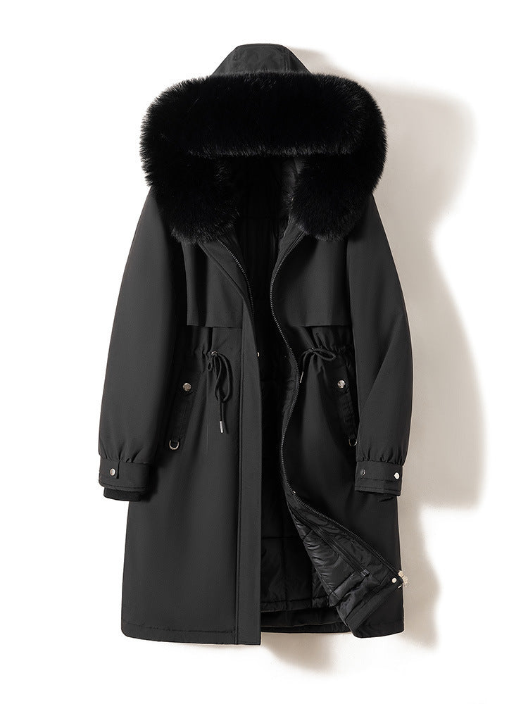Women's longer water-repellent parka with voluminous faux fur hood, adjustable drawstring waist, and quilted thermal inner jacket Mune Fashion