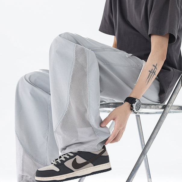 Men's sporty cargo pants with breathable mesh inserts
