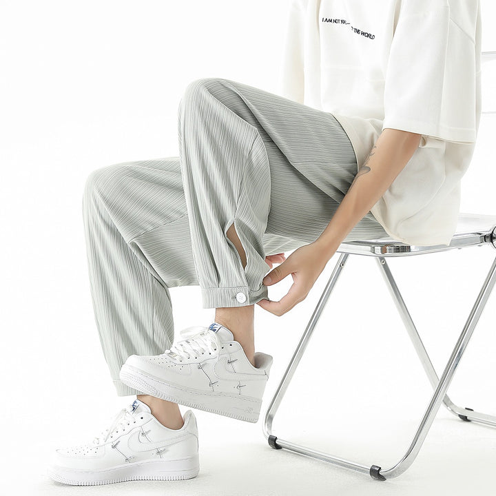 Men's loose-fitting leisure pants with drawstring, fine ribbed structure, and buttoned cuffs Mune Fashion