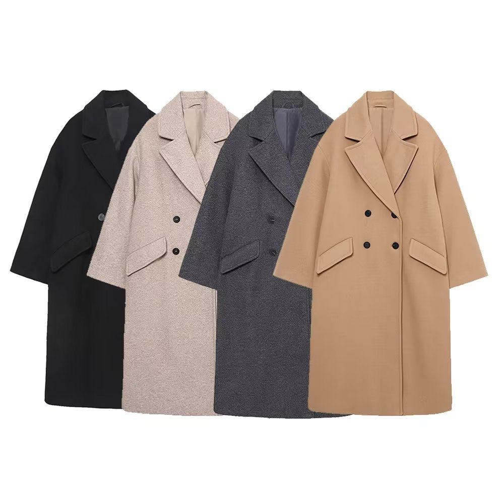 Women’s long cut boxy coat with double-breasted front, overlapping shawl collar, and generous flap pockets Mune Fashion
