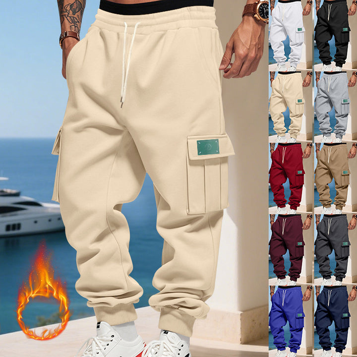 Men's cargo jogging pants with generous flap pockets, elastic waistband, and ribbed cuffs